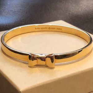 KATE SPADE Gold Bangle Bracelet With Gold Bow